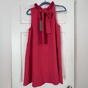 Coral ruffle neck bow back dress